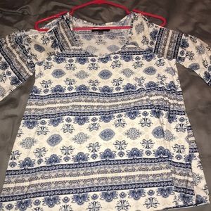 A blue, white, and tan design shirt